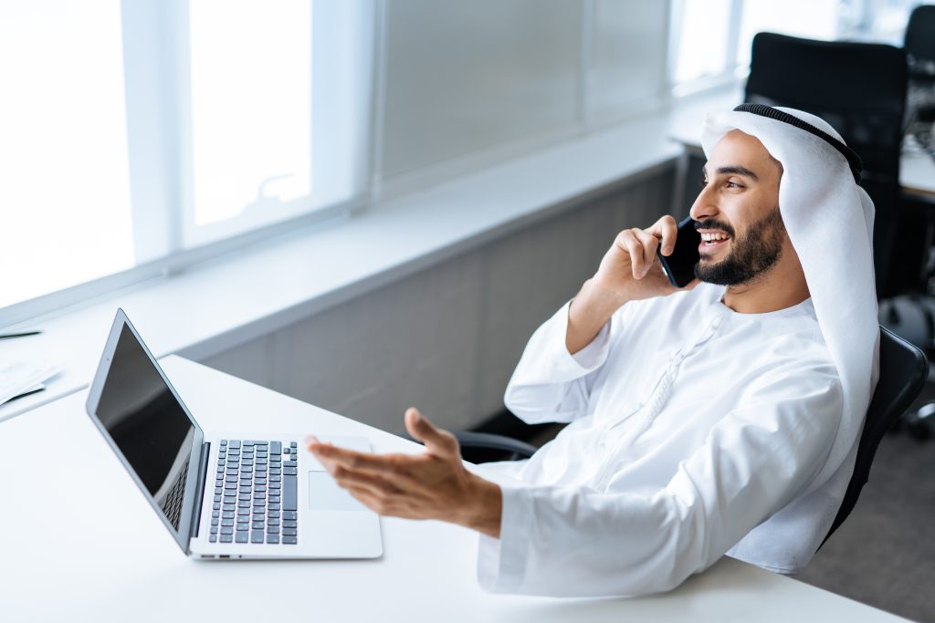 handsome,man,with,dish,dasha,working,in,his,business,office
